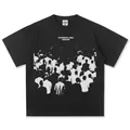 T-shirt nera in cotone pesante con stampa grafica astratta di persone in stile streetwear - S / Tops / Nero