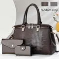 Brown crocodile-patterned three-piece bag set including Boston handbag and small wallets. - 33*14*21 / Three-Piece Set / Coffee