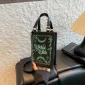 Kleine modische Umhängetasche in Buchform mit Wicked Witch-Thema in mattem Schwarz - Böse Hexe Stil (Stil 2)