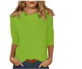 Détail d'un t-shirt femme vert citron à col rond avec des manches 3/4 élégantes - S / Haut / Vert