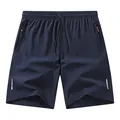 Hochwertige dunkelblaue Sport-Shorts für Herren mit Reflexstreifen und Reißverschlusstaschen - XS / Bottoms / Dunkelblau