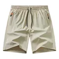 Pantaloncini sportivi da uomo in seta ghiaccio kaki con strisce riflettenti - XS / Pantaloni e gonne / Kaki