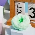 Mint green donut-shaped UV color-changing squeeze toy with slow rebound soft texture - Snow Skin Matcha Stress Ball