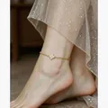 Elegante tobillera chapada en oro con trébol de cuatro hojas y circonitas brillantes - Dorado