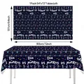 Detailed view of 54x72 inch Day of the Dead tablecloth with colorful skull patterns - 桌布A款
