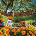 Detailed view of Mexican Day of the Dead felt banners featuring orange butterfly cut-out designs. - 4 Pieces Butterfly Pull Flag