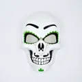 Close-up of Day of the Dead skull mask with green floral patterns and black details - Green Eye Pattern