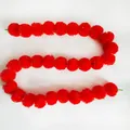 Vue détaillée de la guirlande de souci artificielle rouge vif pour décoration - N°4 Rouge