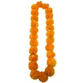 Leuchtend orangefarbene Ringelblumengirlande für Tag der Toten und Partydekorationen - Orange