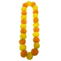 Detail showing vibrant yellow and orange artificial marigold garland for Day of the Dead - Yellow+Orange