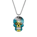 Detailed close-up of a stainless steel skull pendant with colorful Day of the Dead print - Steel / Bahamas
