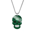 Close-up of green Day of the Dead skull pendant with Arabic script on stainless steel chain - Steel / Saudi Arabia Flag