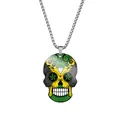 Detail view of a stainless steel necklace with a colorful Jamaican flag sugar skull - Steel / Jamaica
