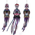 Sugar skull hanging decorations with colorful streamers for Halloween and Day of the Dead - Day of the Dead Decoration 3-Piece
