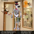 Hanging Halloween paper skeleton decoration with a black top hat and a pink bow tie - Paper Top Hat Skull