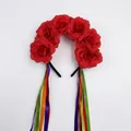 Detailed view of red fabric roses and vibrant satin ribbons on a festive headband - Red Rose Ribbon
