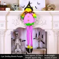 Whimsical purple hanging witch decoration with smiling face for Halloween home decor - Door Hanging Smiling Face Boots Purple