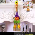Handmade Halloween straw broom with pumpkin face and purple hat for party decor - Broom Pumpkin