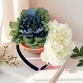 Close-up of 12cm oversized artificial camellia headband for wedding party - Blue Green Gradient And White (FG215-7)