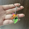Detailansicht eines mexikanischen Karneval-Acryl-Schlüsselanhängers mit Sombrero. - Grüner Chili / 5cm Schlüsselanhänger