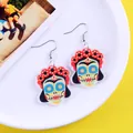 Close-up detail of vibrant Mexican Day of the Dead sugar skull earrings with floral crown - Horror Face