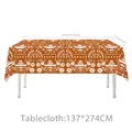 Tovaglia arancione Giorno dei Morti con teschi e chitarre, dimensioni 137x274cm. - Tovaglia Stile 04 / 137x274cm