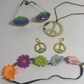 Detail view of a hippie accessory set featuring rainbow sunglasses and peace sign jewelry - One Size / Clip-on Earrings / Gold