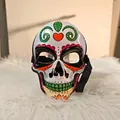 Detailed view of resin Day of the Dead skull mask with colorful painted patterns - Painted Style C Skull
