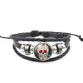 Detailweergave van meerlagige geweven lederen armband met kleurrijke Mexicaanse suikerschedel - Mexicaanse Suiker Schedel Stijl (XL0194)