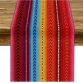 Close-up of vibrant Mexican bohemian style table runner with colorful stripes - Style 16