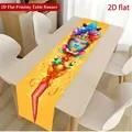 Detailed view of vibrant 2D printed carnival mask table runner on a dining table - 33*91cm / Yellow