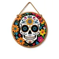Detailed view of wooden Day of the Dead sugar skull plaque with colorful floral patterns - Wooden Skull Style 09
