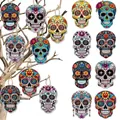 Assorted colorful wooden sugar skull hanging ornaments for Day of the Dead party decor - Style D