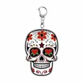 Close-up detail of a colorful Sugar Skull acrylic keychain featuring vibrant red heart eyes - Web Heart Skull Style (11259) / 55mm