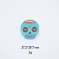 Dettaglio della spilla a teschio messicano con dimensioni 27,2x29,7 mm e peso 5g - Teschio Occhio Cuore Blu Cielo (04)