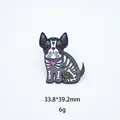Detail view of colorful Mexican Sugar Skull dog enamel pin, 33.8x39.2mm, 6g weight - Black Skeleton Frenchie (07)