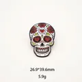 Macro view of Mexican sugar skull enamel pin with colorful floral heart details - White Base Heart Eye Skull (13)