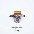 Close-up detail of Mexican sugar skull enamel pin with hat showing dimensions 31.5x39.7mm - Pink Ball Yellow Hat Skull (18)