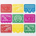 Detailed view of colorful Day of the Dead Mexican papel picado banners with cut-outs. - Day Of The Dead Theme Banner
