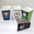 Day of the Dead party snack boxes with colorful sugar skull designs and scalloped edges. - Day of the Dead Popcorn Boxes / Set of 4