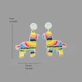 Dettaglio orecchini a forma di pinata colorata con borchie glitterate e dimensioni. - Stile Piñata Asino (E3)