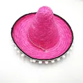 Detailed top view of a bright pink Mexican straw sombrero with white pom-pom trim. - M (56-58cm) / Diameter 35cm / Rose Red