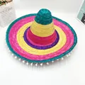 Detailed view of a colorful Mexican straw sombrero with white pom-poms fringe. - Green Trim Pom-pom Style / 50cm Diameter / Colorful