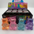 Four colorful glittery aurora gummy bear squishy stress relief toys for kids and adults - Aurora Bear / Pink