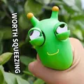 Grappige groene draak stress-speeltje met ploppende ogen voor ontspanning - Uitpuilende Ogen Worm / 7.5cm