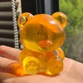 Vibrant orange translucent gummy bear squeeze toy with slow rebound soft texture - Orange