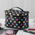 Large capacity portable makeup bag with vibrant colorful polka dot pattern for travel storage - Colored Polka Dots