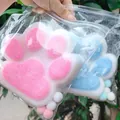 Due giocattoli squishy giganti a zampa di gatto in rosa e blu in buste trasparenti. - Zampa Di Gatto Gigante In Peluche [15*14] Colore Casuale