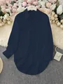 Detailed view of dark navy blue women's shirt with irregular hem on a styled background - S / Tops / Navy Blue