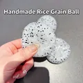 Balle artisanale anti-stress créative style pierre de lune blanche pour la détente - Balle Fidget Grain de Riz